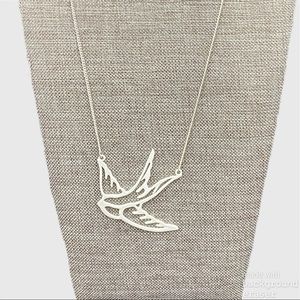 Necklace metal white bird